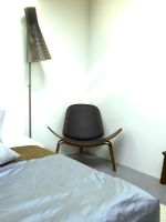 Bedroom with Seppo Koho lamp and Shell chair