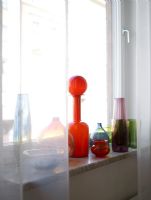 Detail of collection of retro glassware on window ledge