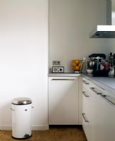 Modern white kitchen parquet flooring