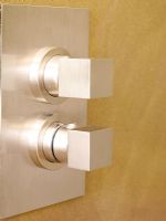 Detail of contemporary  wall mounted shower controls 