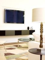 Contemporary living room with wall mounted plasma screen television