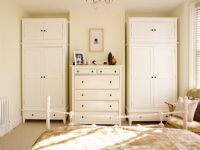 Modern bedroom with wardrobes in alcoves 
