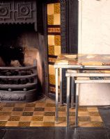 Detail of cast iron fireplace and tiled surround