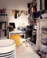 Cluttered home office space