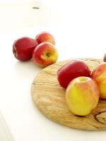 Detail of apples on kitchen worktop