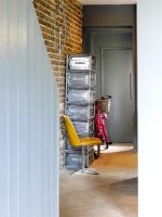 Hallway with exposed brick wall