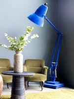 Living room with oversized blue lamp
