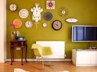 Modern living room with Eames RAR Rocker and collection of clocks 