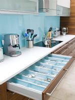 Modern kitchen with open drawer 