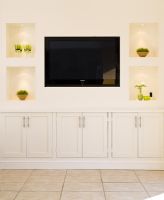 Modern living room with wall mounted television 