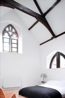 Modern bedroom in converted church