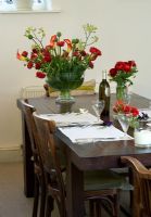 Dining room with table and flowers