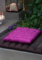 Purple cushion in garden 