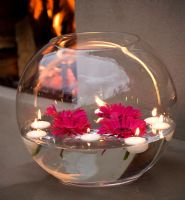 Floating candles in garden 