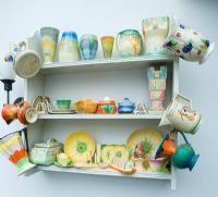 Clarice Cliff pottery on a shelf