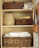 Detail of baskets in cupboard