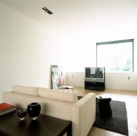 View of flat screen and sofa in living room
