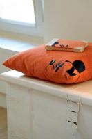 Book on cushion on chest in child's room