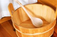 Close-up of wooden bucket with spoon