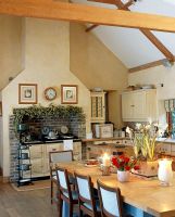 Kitchen with aga and dining table