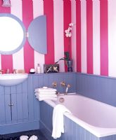 Bathroom with red and white striped walls