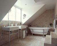 Modern bathroom with twin sinks and bath