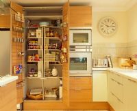 Open food cupboard in kitchen