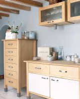 Modern kitchen with freestanding cupboards