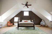 Bed in attic bedroom
