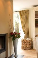 Living room with fireplace and wicker basket