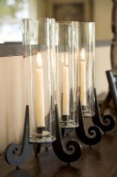 Hurricane lamps in a row