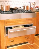 Modern kitchen cooker with storage drawers