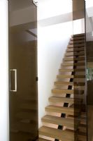 Modern glazed doors to staircase 