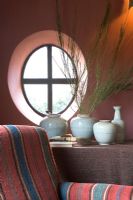 Oval window in classic living room 