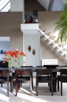 Modern dining room and staircase 