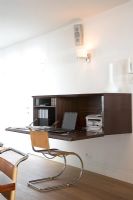 Wall mounted desk in open plan living area
