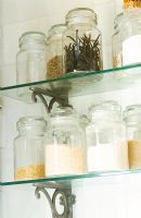 Cooking ingredients in glass jar on shelf