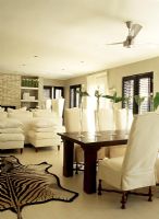 Living room with a zebra skin rug