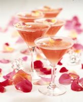Martini glasses with flower petals