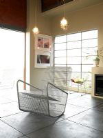Living room with modern metal armchair
