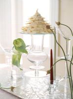 View of plant with candle stand on table, close-up