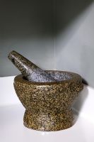 Detail of granite pestle and mortar