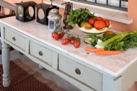 Fruit and vegetables on worktop