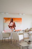 Modern dining room with vintage movie poster 