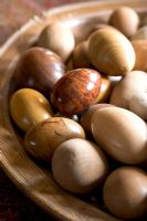 Bowl of stone and wooden balls, detail