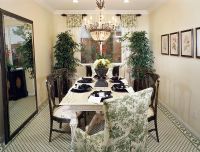 Elegant Green Dining Room with Black Place Settings