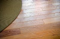 Rug on Hardwood Floor