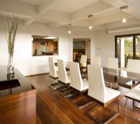 Modern White Dining Room with Hardwood Floors