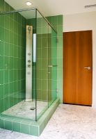 Modern Bathroom with Green Shower Tiles