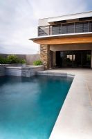 Rear Exterior of Modern Home and Swimming Pool